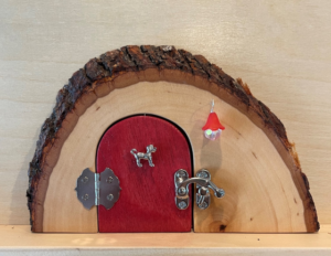 red handcrafted tooth faerie door