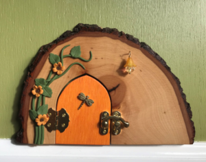 orange handcrafted tooth faerie door