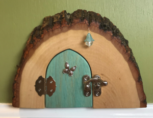 bluish handcrafted tooth faerie door