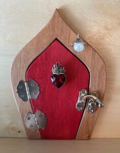 red handcrafted faerie door